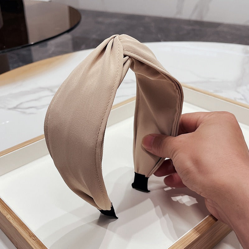 Fashionable fabric cross bow headband - Korvel
