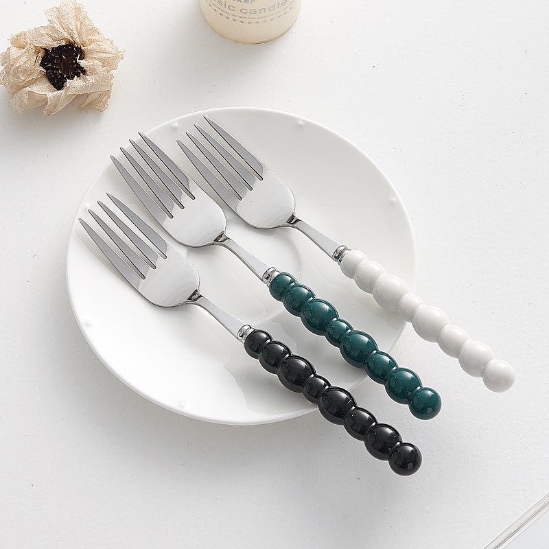 Set of 4 Stainless Steel price Creative Stainless Steel Colorful Pearl Handle Spoon Fork Knife High End Cutlery Set - Korvel