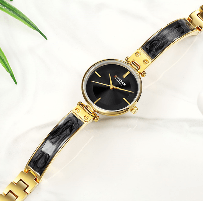 Montre en acier inoxydable élégante pour femmes avec bracelet en céramique