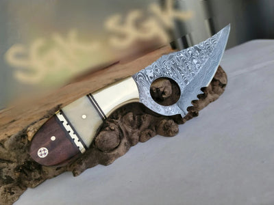 Artisan Damascus Steel Skinning Knife with Ergonomic Finger Hole and Elegant Handle - Korvel