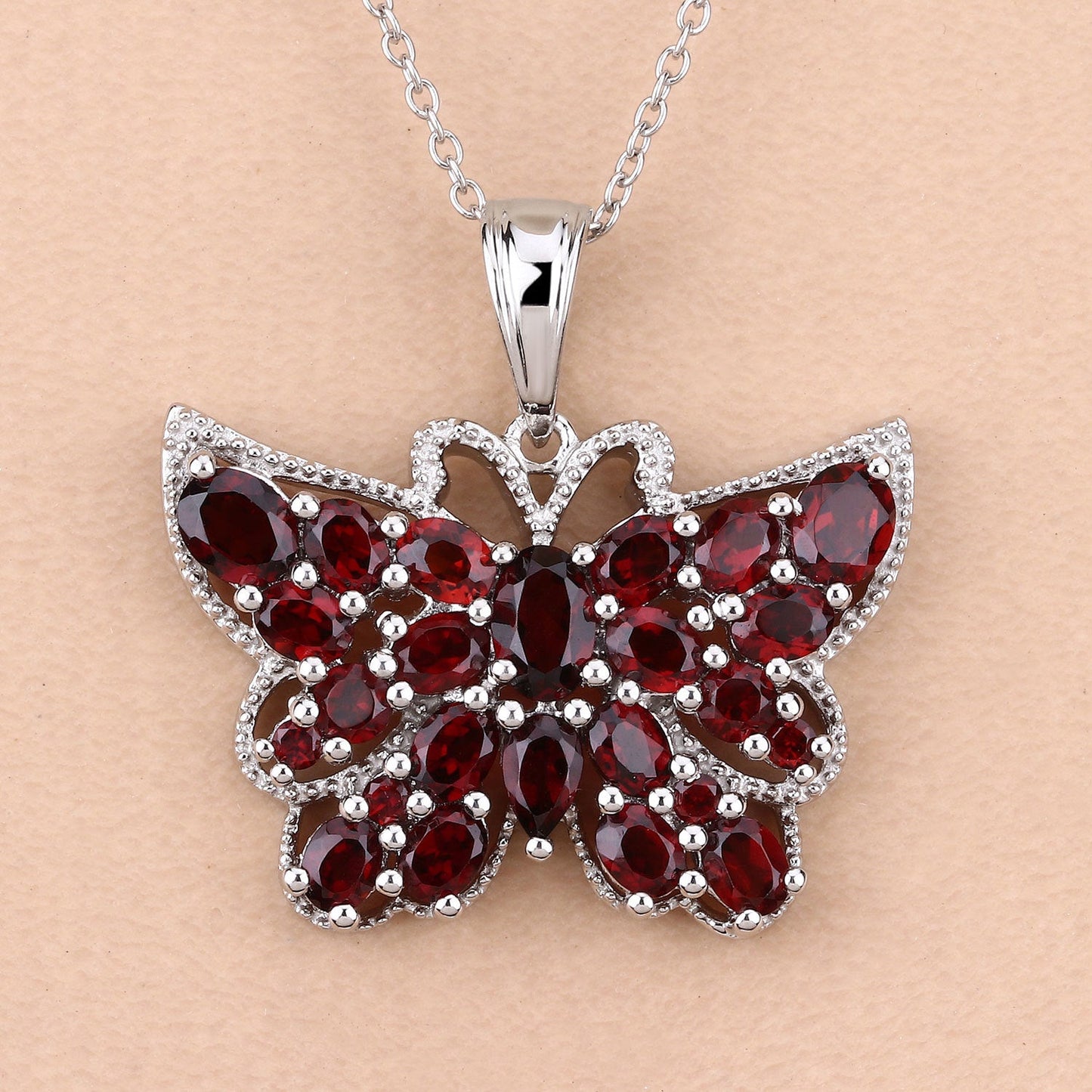 Colgante de Mariposa de Granate Genuino de 4.90 Quilates en Plata Esterlina
