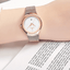 Montre en acier inoxydable élégante pour femme avec bracelet tressé