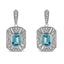 Boucles d'oreilles en argent sterling .925 avec topaze bleue en forme d'émeraude et accents de diama