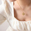 Collier en forme de montre en acier titane zircon
