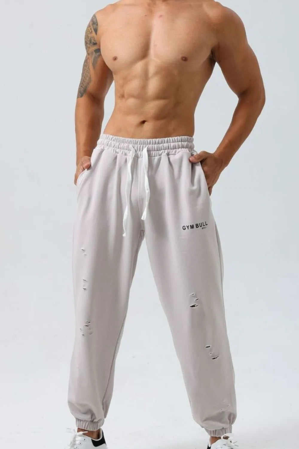 Joggers de tiro alto para hombres en tallas grandes con diseño desgastado y cordón
