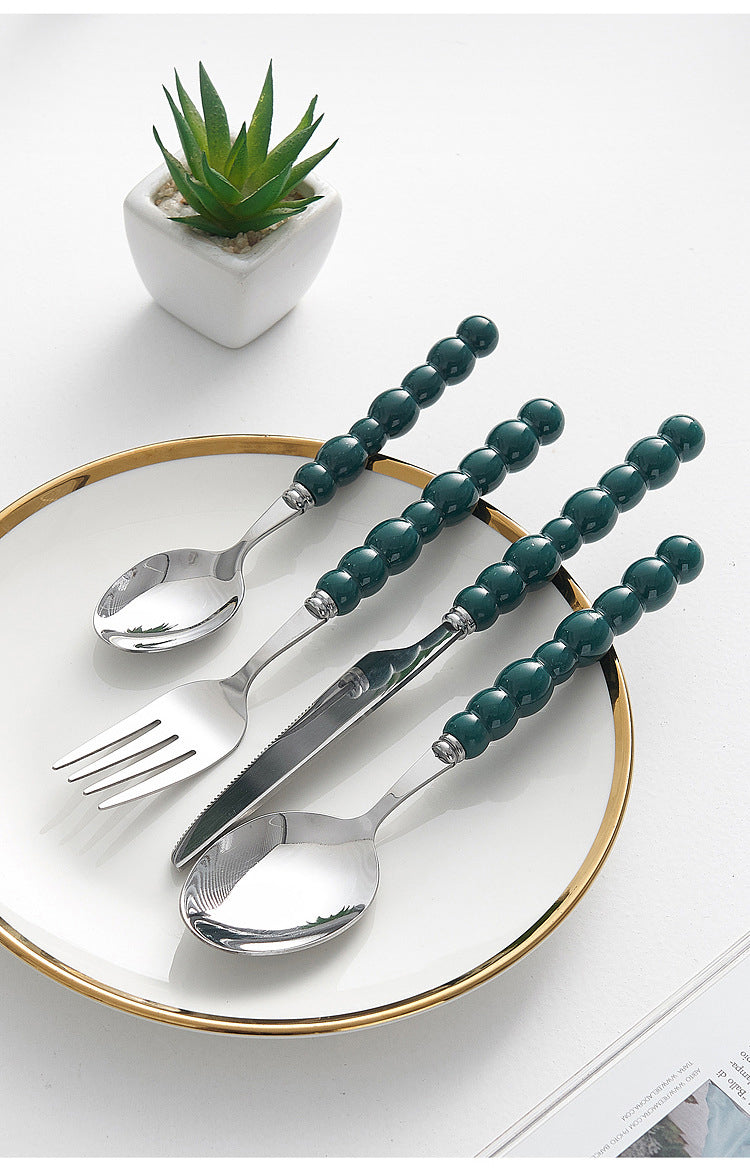 Set of 4 Stainless Steel price Creative Stainless Steel Colorful Pearl Handle Spoon Fork Knife High End Cutlery Set - Korvel