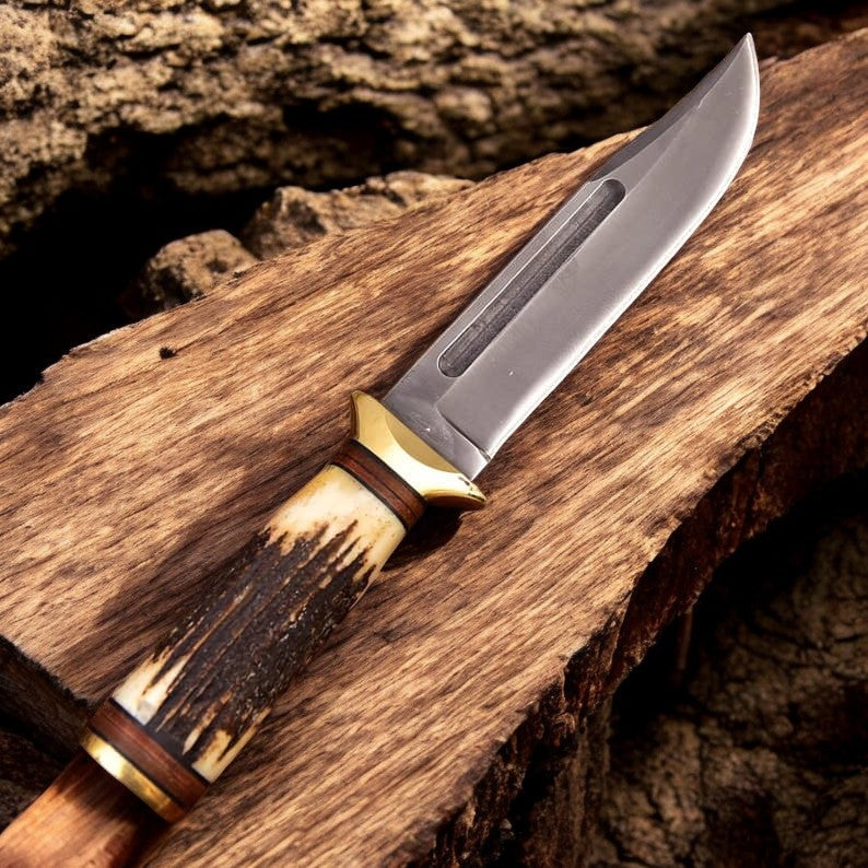 Elias Boone's Heritage High Carbon Hunting Knife: Antler-Handled Excellence - Korvel