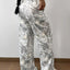 Pantalons de survêtement à jambe large imprimé abstrait