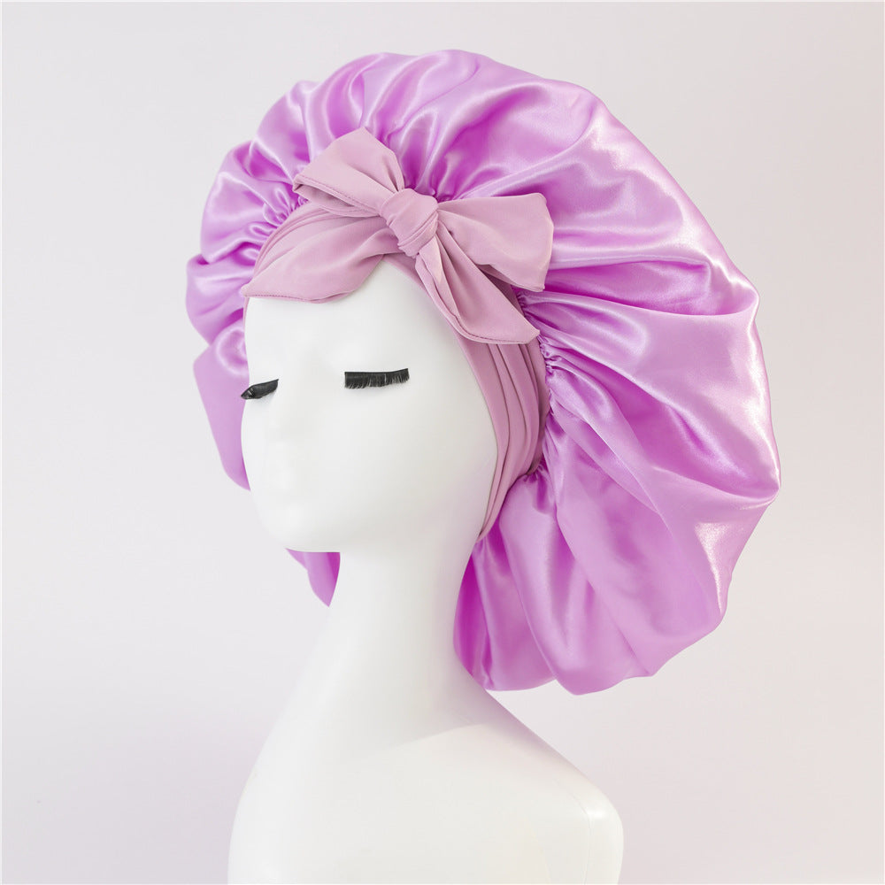 Turban élégant à large bord avec détail en nœud