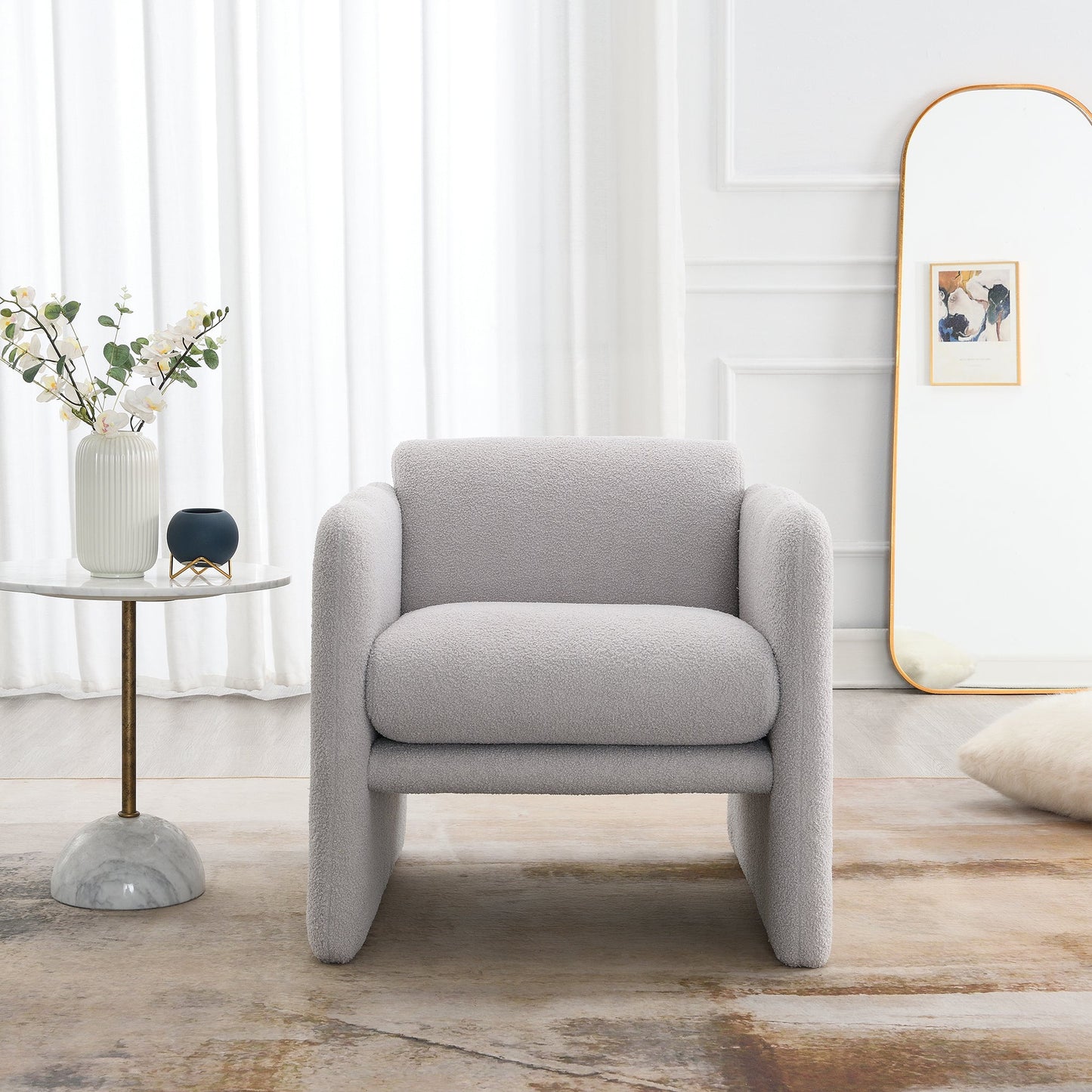 Armchair with wavy armrests, metal decorations on both sides of the armrests, made of Teddy cloth, light gray - Korvel