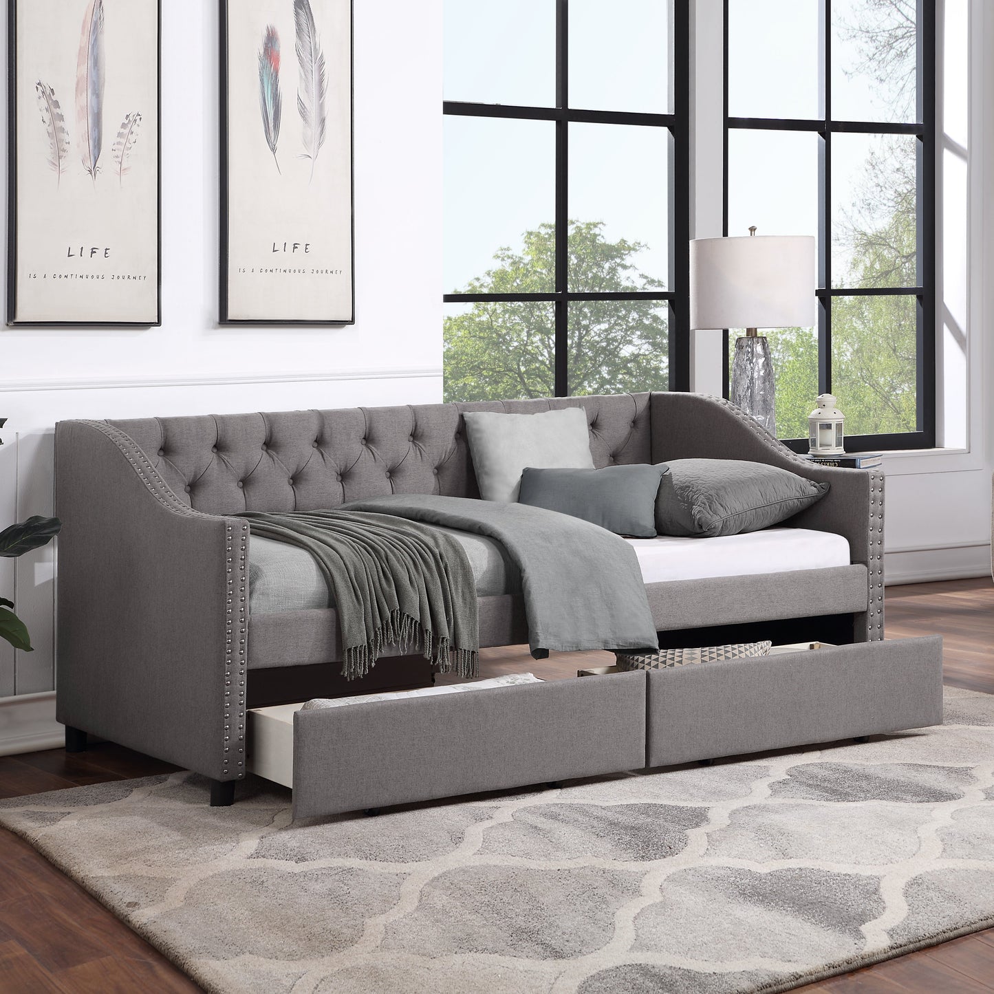 Cama nido tapizada de tamaño individual con dos cajones - Gris
