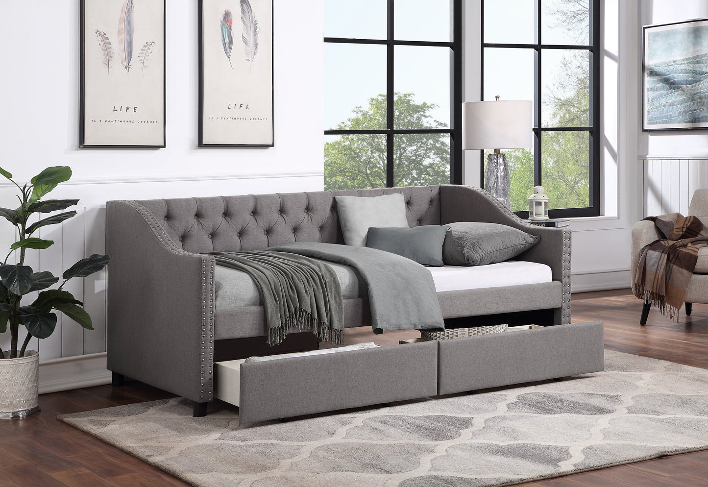 Cama nido tapizada de tamaño individual con dos cajones - Gris