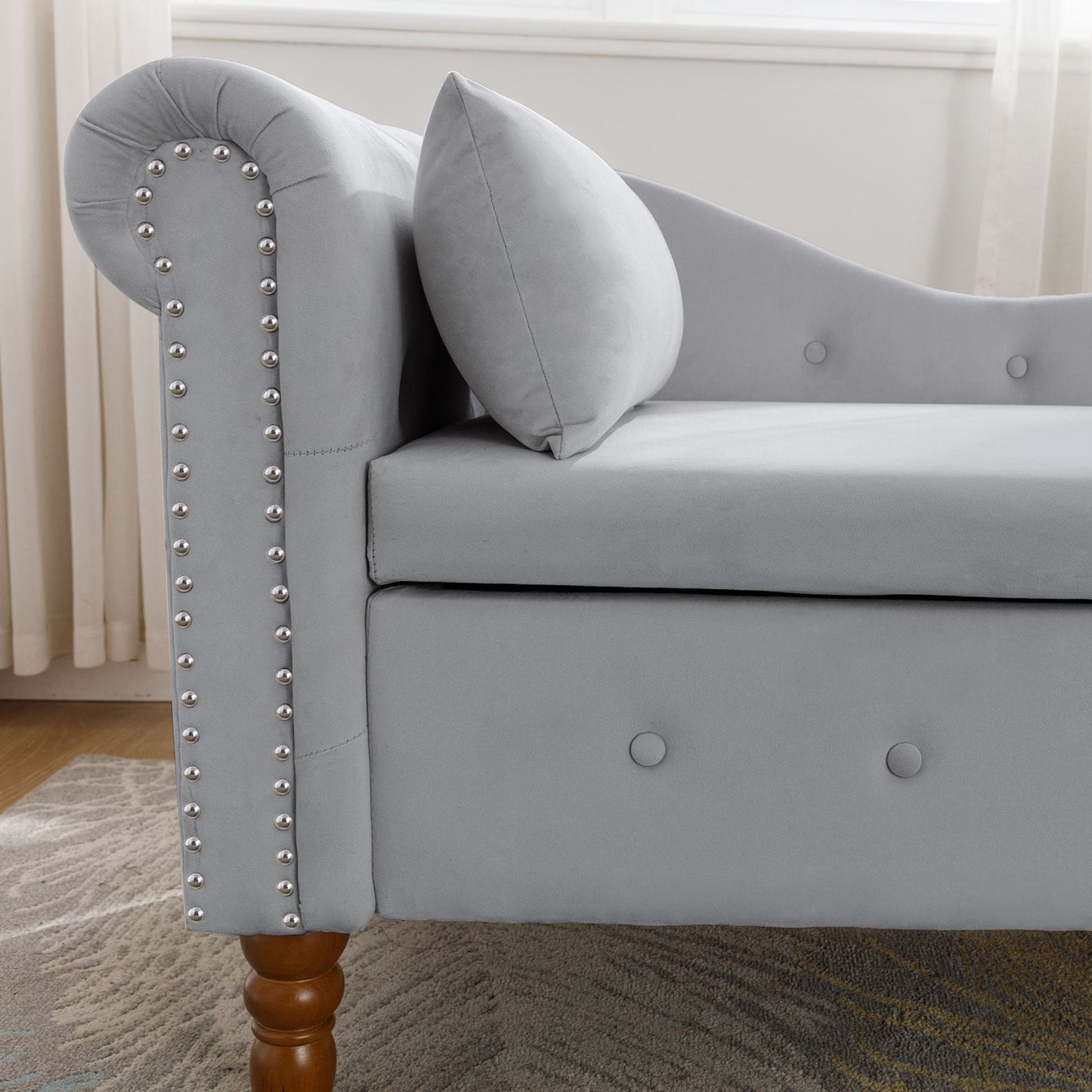 Chaise longue en velours gris avec rangement et coussin