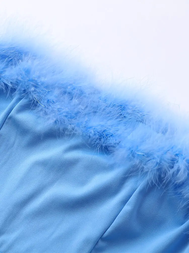 Combinaison Femme à Paillettes avec Panneaux en Plumes