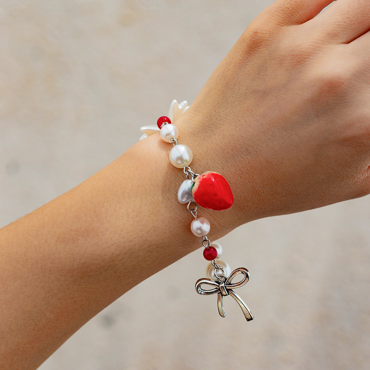 Sweet strawberry bow bracelet Bracelet temperament versatile imitation pearl vacation jewelry - Korvel