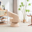 Fauteuil pivotant en tissu teddy nude