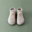 Chaussures de sol souples pour bébés avec chaussettes pour les premiers pas