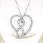 Collar con colgante de corazón y cinta de concienciación de diamantes en oro blanco de 14 quilates
