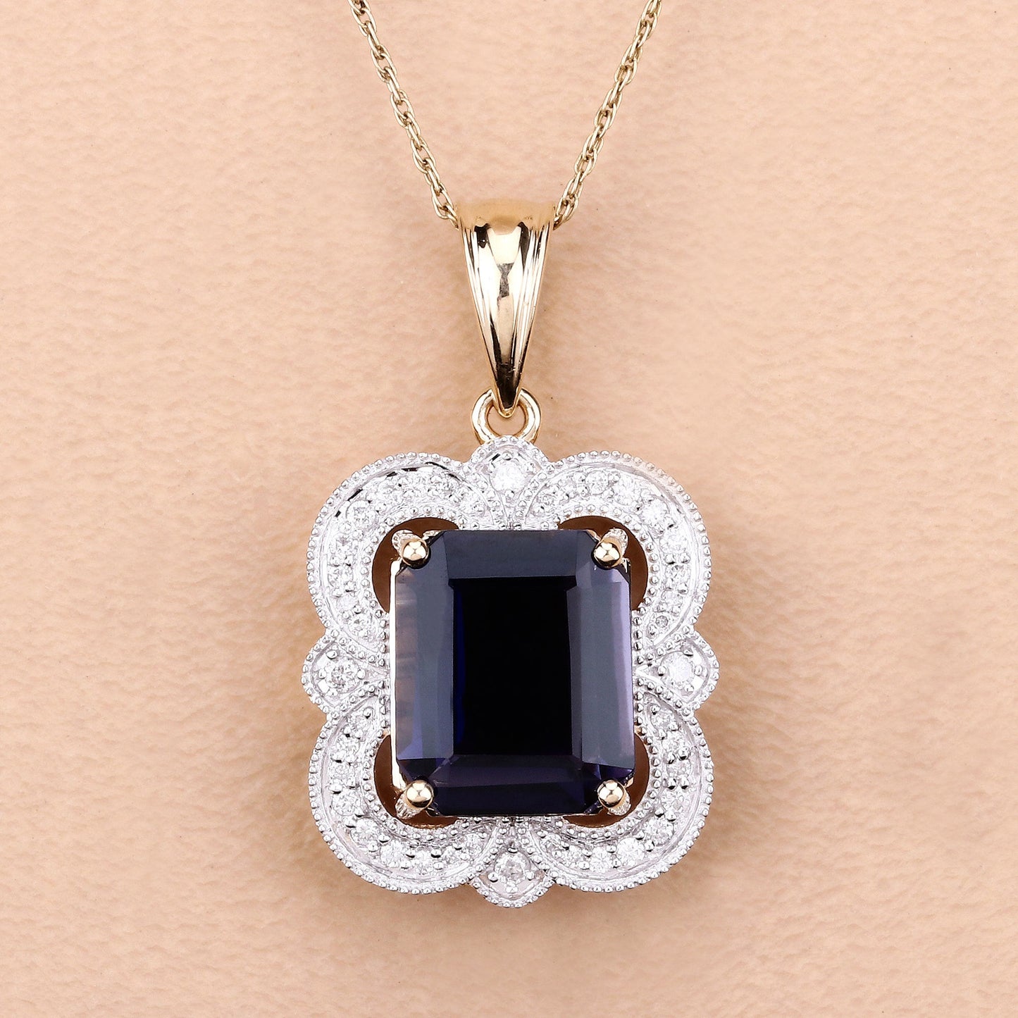 4.07 Carat Iolite and Diamond 14K Yellow Gold Pendant