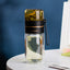 Bouteille d'eau en verre premium avec infuseur à thé