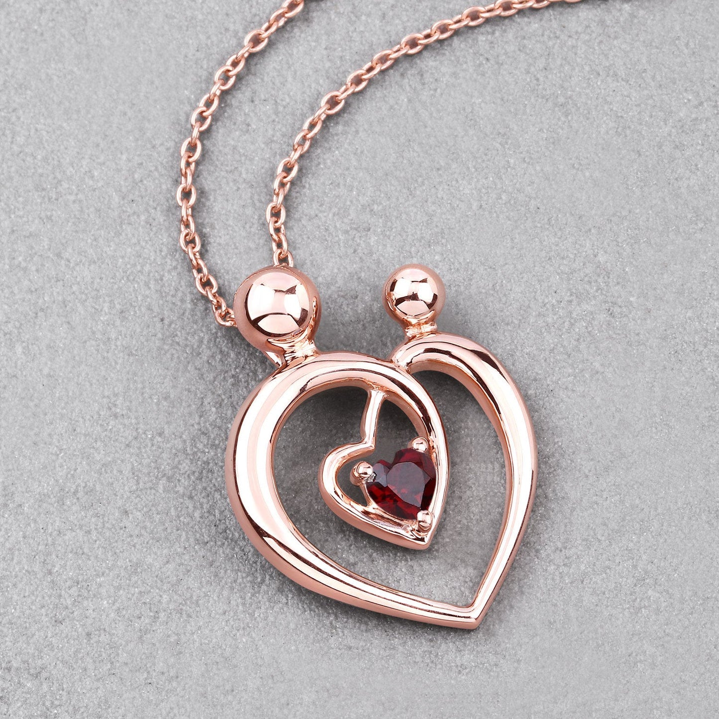 Pendentif en grenat véritable de 0,32 carat en argent sterling .925