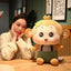 Jouets en peluche singe assis charmants pour tous les âges