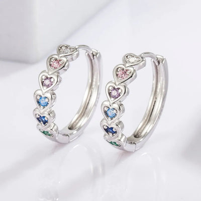 Boucles d'oreilles Huggie en argent sterling 925 avec cœur en zircon incrusté