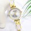 Montre en acier inoxydable élégante pour femmes avec bracelet en céramique