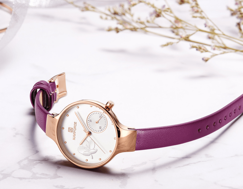 Montre analogique à quartz élégante pour femmes avec bracelet en cuir