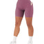 Shorts de sport croisés pour femmes avec ceinture et poches