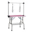 36 inch folding pet grooming table with stainless steel frame and rubber pad, equipped with adjustable armrests and clips (pink) - Korvel