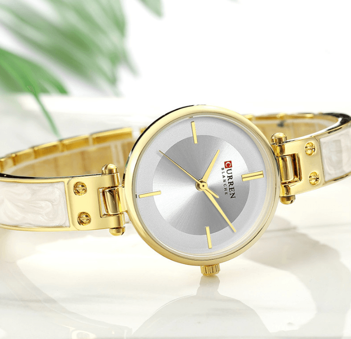 Montre en acier inoxydable élégante pour femmes avec bracelet en céramique