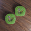 Curious Garden Cat Round Floor Pillow – Green Paw Print Accent Cushion