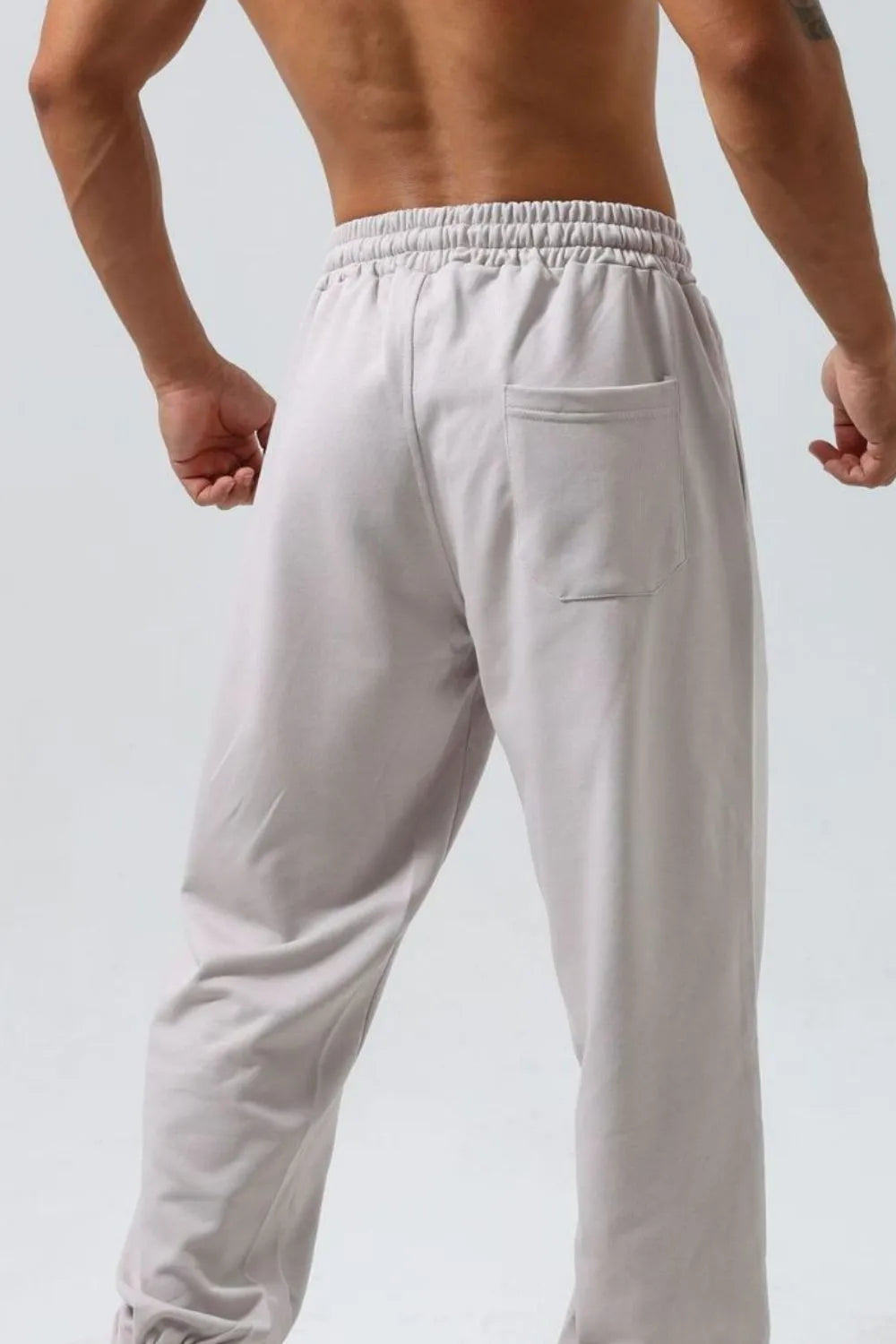Joggers de tiro alto para hombres en tallas grandes con diseño desgastado y cordón