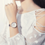 Montre analogique à quartz élégante pour femmes avec bracelet en cuir