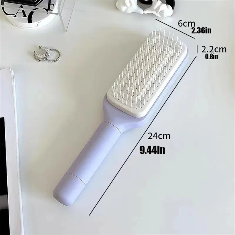 Brosse à cheveux rotative auto-nettoyante avec caractéristiques anti-statiques