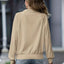 Chaqueta blanca con cremallera y cuello para mujer versátil