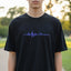 Camiseta Unisex Minimalista de Concienciación sobre la Epilepsia con Onda EEG - Diseño Púrpura