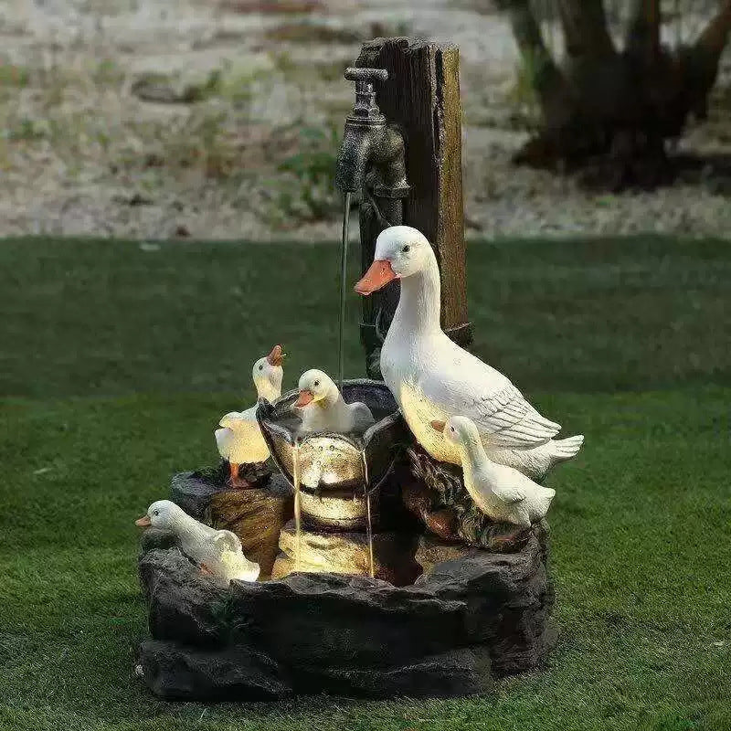 Solar resin duck garden fountain with LED squirrel design, outdoor decor (E2). - Korvel
