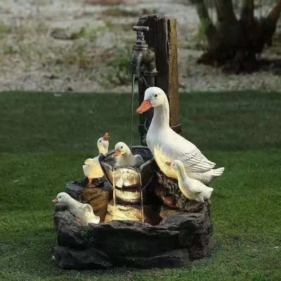 Solar resin duck garden fountain with LED squirrel design, outdoor decor (E2). - Korvel