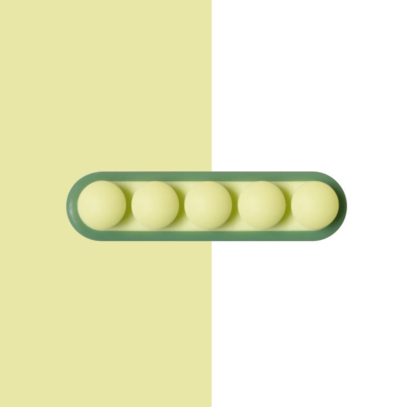 Desktop wall self-adhesive wire winding device cartoon pea wire fixing device - Korvel