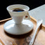 Ensemble de tasses et soucoupes à café exquisément préparées à la main