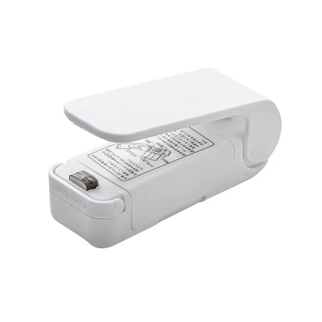 Mini sealing machine small household plastic sealing machine snack moisture-proof sealing machine - Korvel