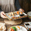 Assiette en céramique pour dumplings et sushi avec partition