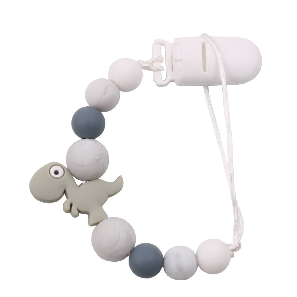 New baby pacifier chain clip teeth glue toy anti-drop chain silicone dinosaur pacifier chain baby products - Korvel