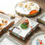 Assiette en céramique pour dumplings et sushi avec partition