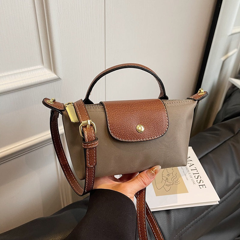 2025 Women's Mini Dumpling Handbag. Made of high - end nylon. Stylish shoulder/crossbody phone bag. - Korvel