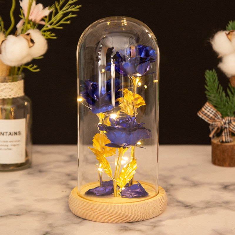 Ornement en verre avec roses en feuille d'or et lumière LED
