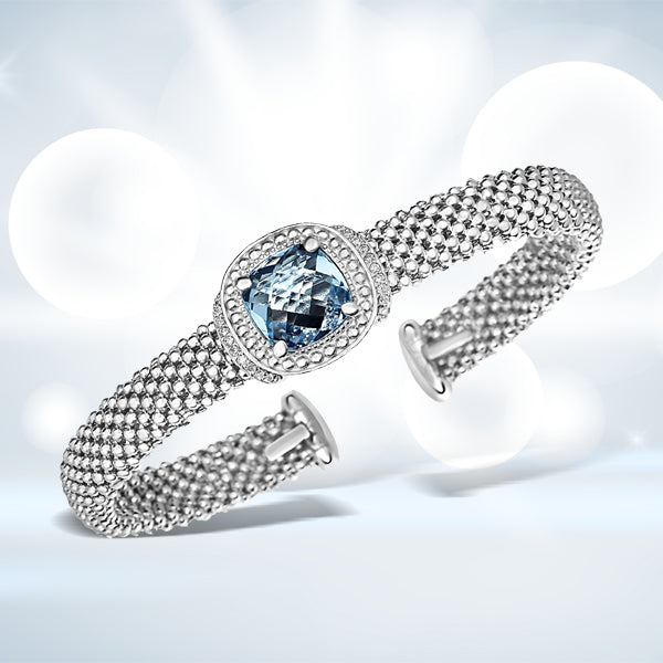 Bracelet jonc en texture popcorn avec topaze bleue et diamants