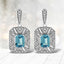 Boucles d'oreilles en argent sterling .925 avec topaze bleue en forme d'émeraude et accents de diama